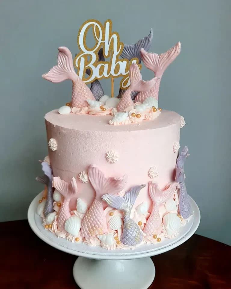 Bespoke baby shower cake with 'Oh Baby' topper and mermaid decoration