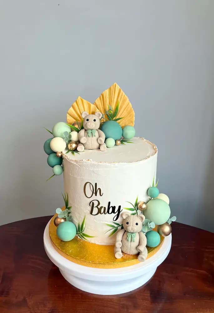 Handmade baby shower celebration cake by Thelwall Bakehouse