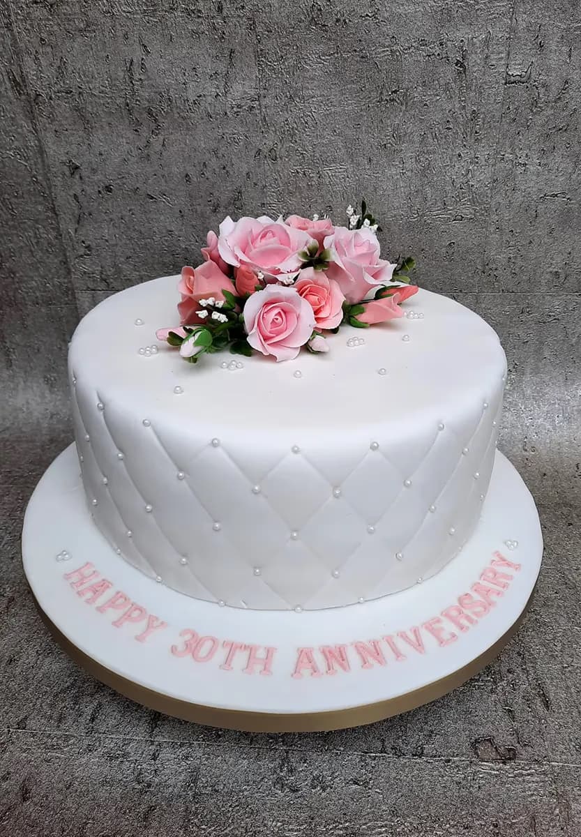 30th anniversary cake with white quilted fondant and pink roses
