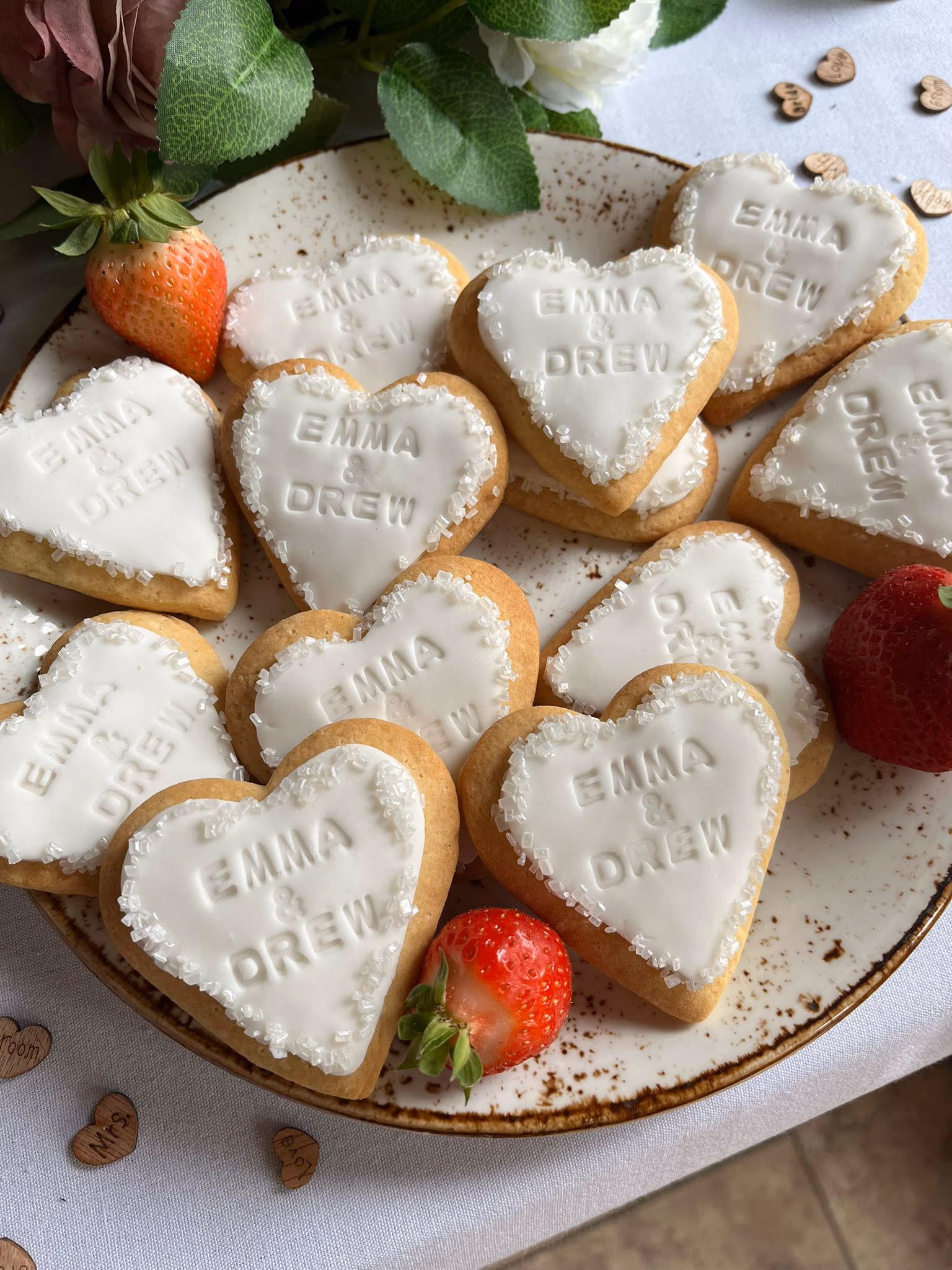 Personalised heart biscuits for a wedding by Thelwall Bakehouse