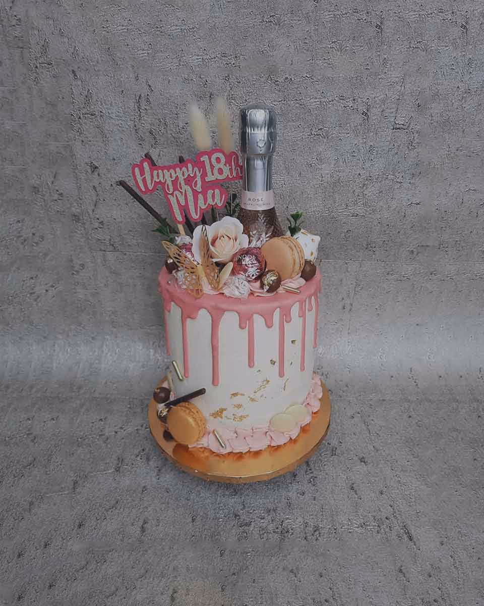 18th birthday cake mia pink drip champagne macarons flowers