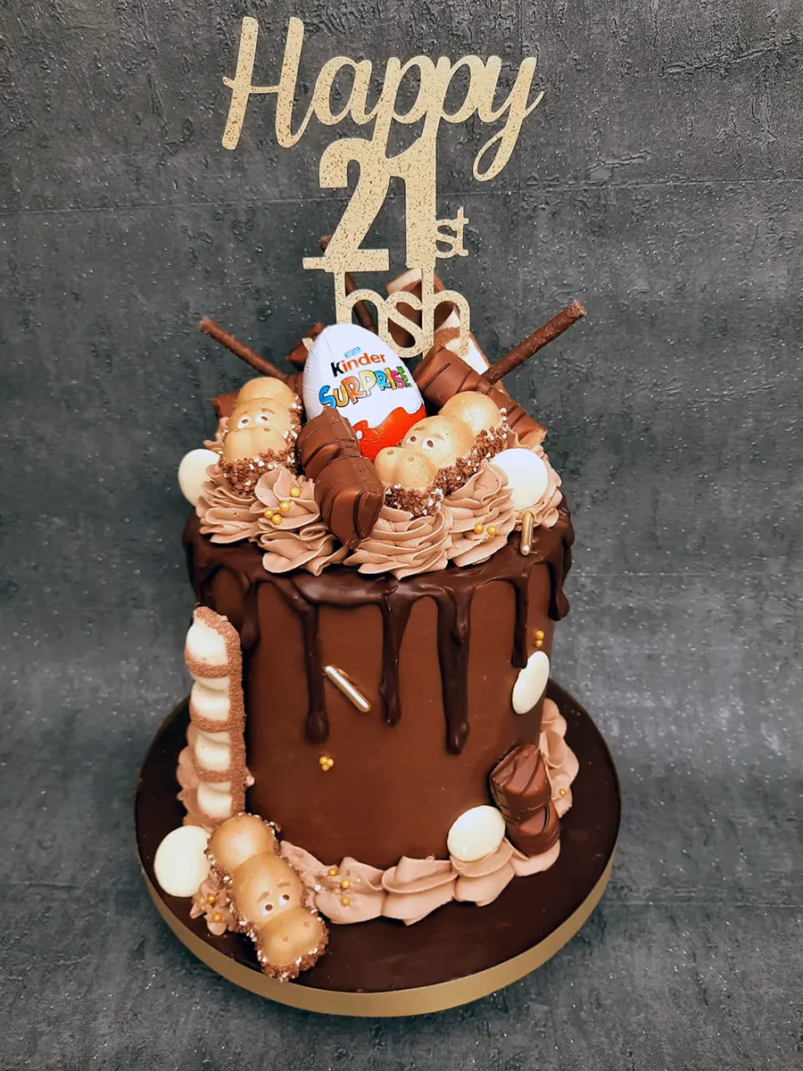 21st birthday chocolate drip cake with Kinder Surprise decoration