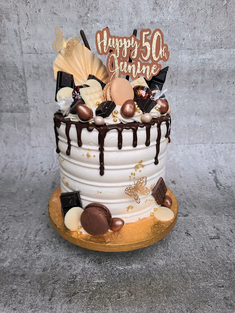 50th birthday cake janine chocolate drip macarons gold butterflies