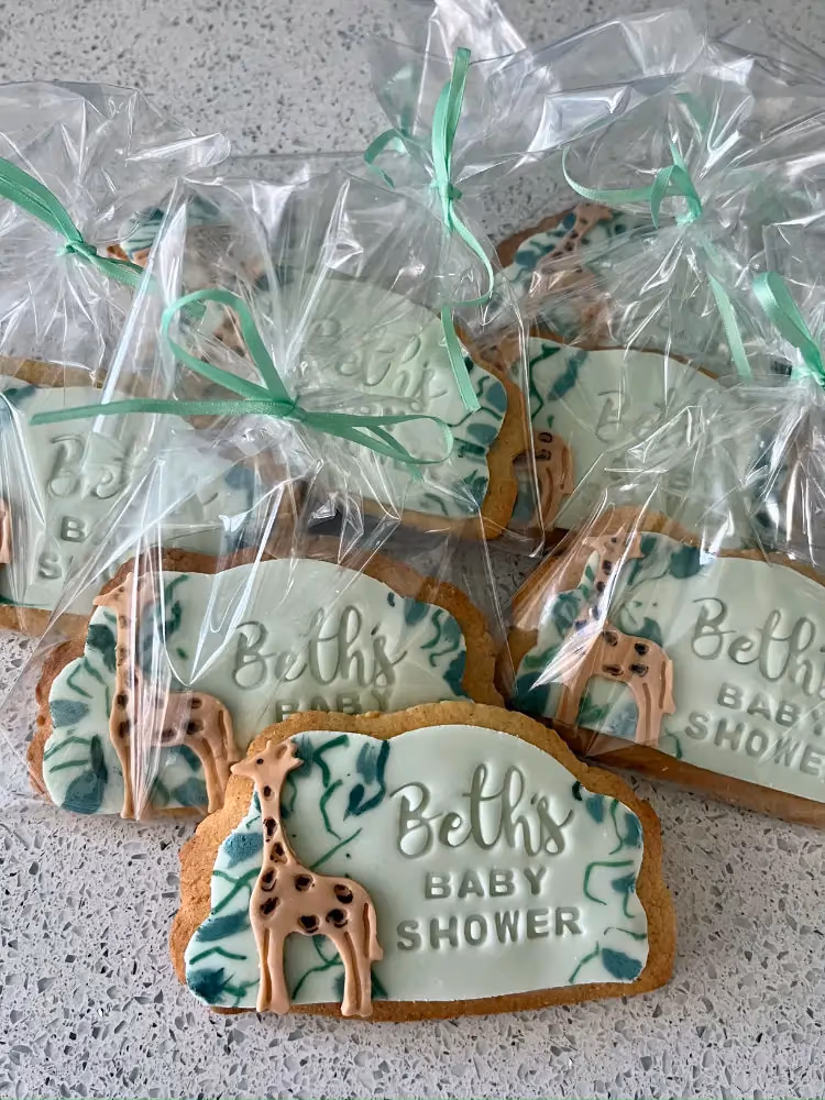Personalised decorated iced biscuits for a baby shower by Thelwall Bakehouse