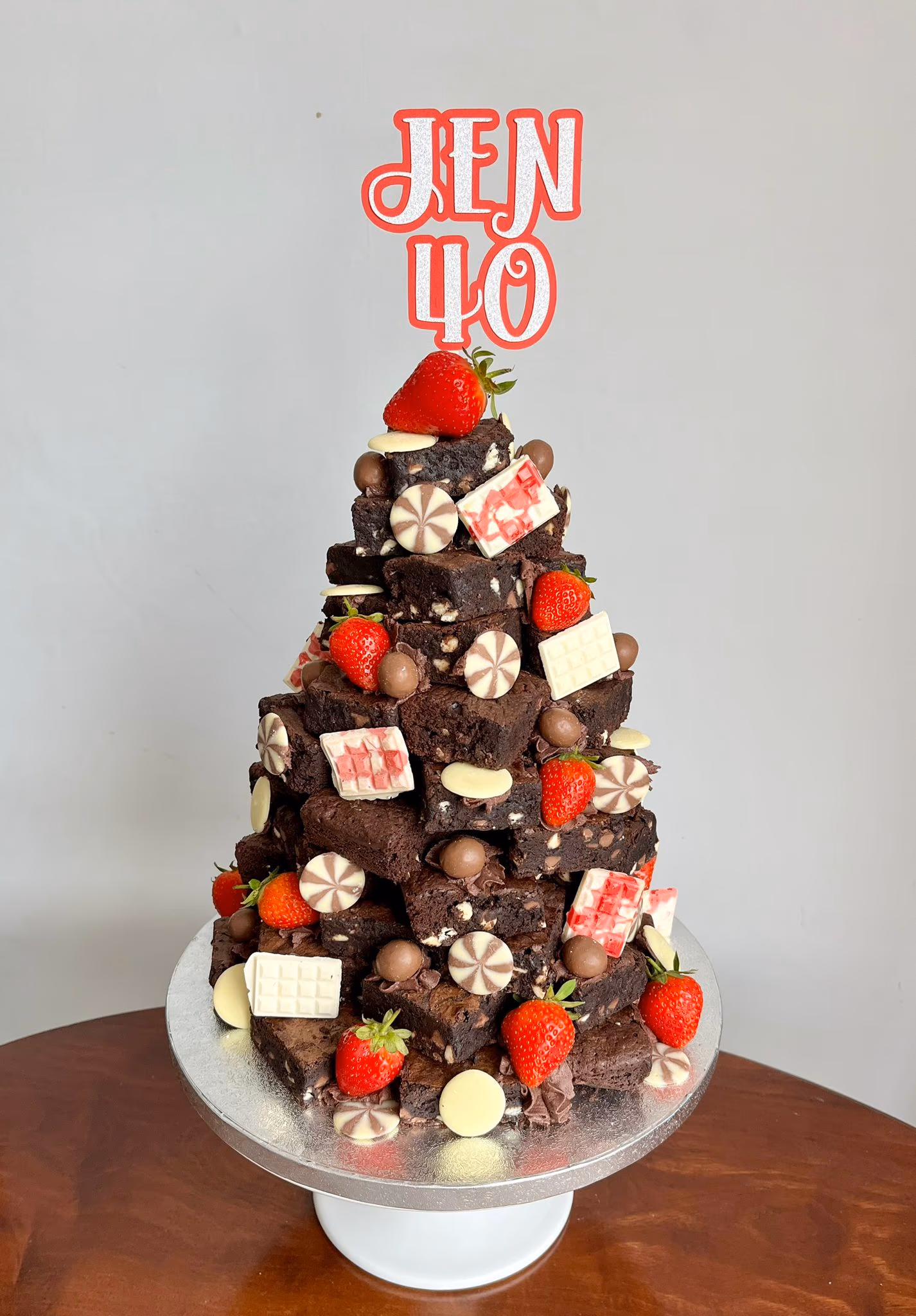 Brownie stack for a 40th birthday with strawberries and white chocolate by Thelwall Bakehouse