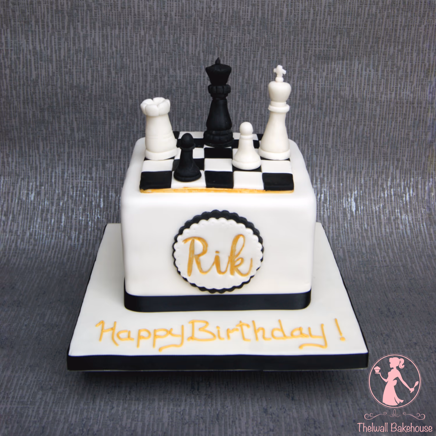 Square white and black chess themed birthday cake