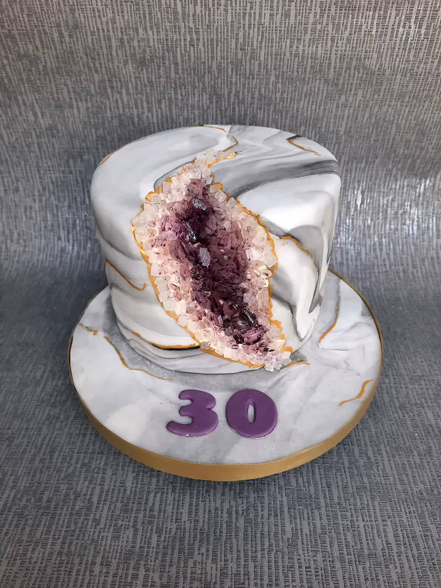Geode marble 30th birthday cake with purple crystal decoration