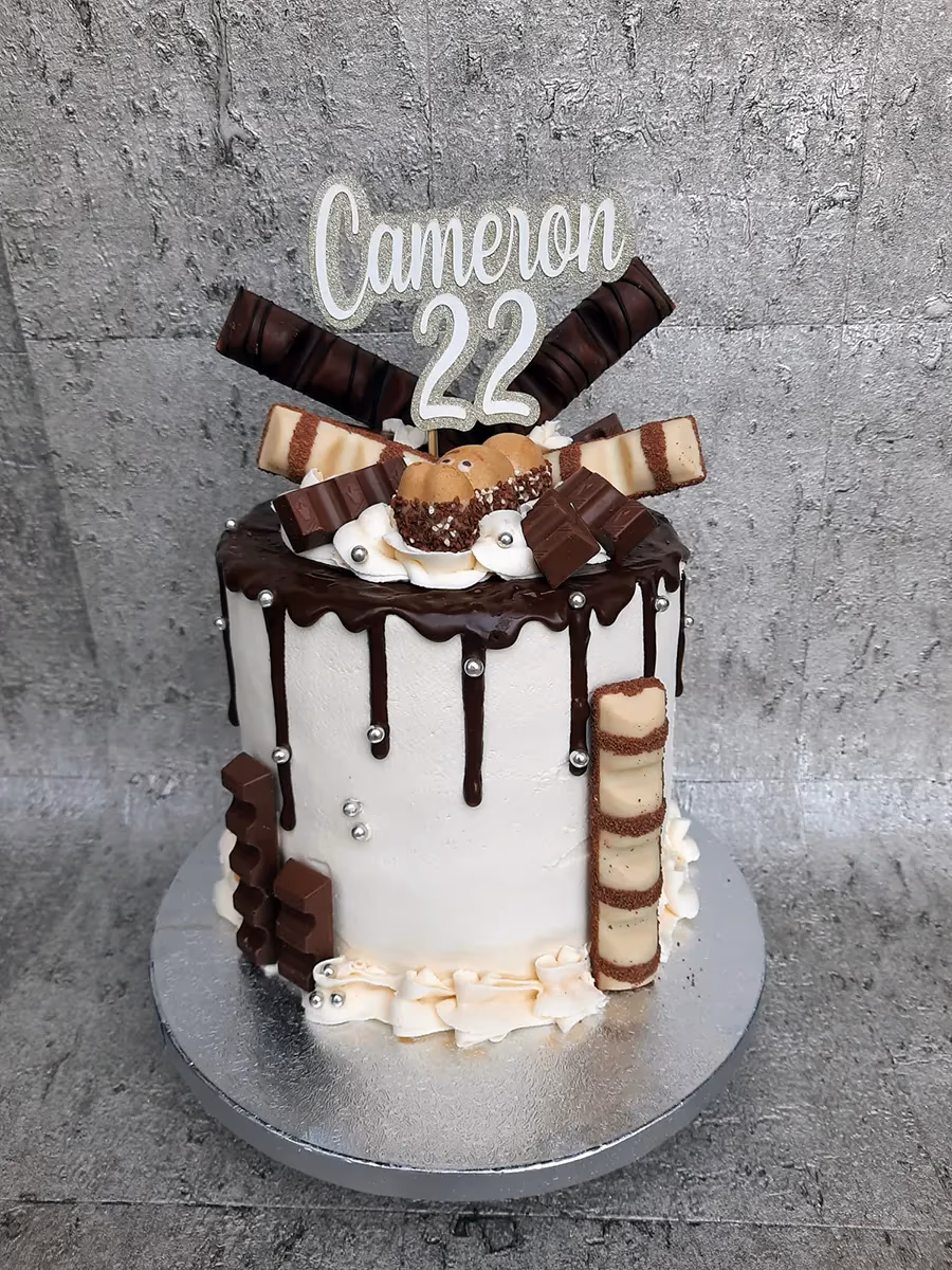 Kinder chocolate drip cake white 22nd birthday cameron