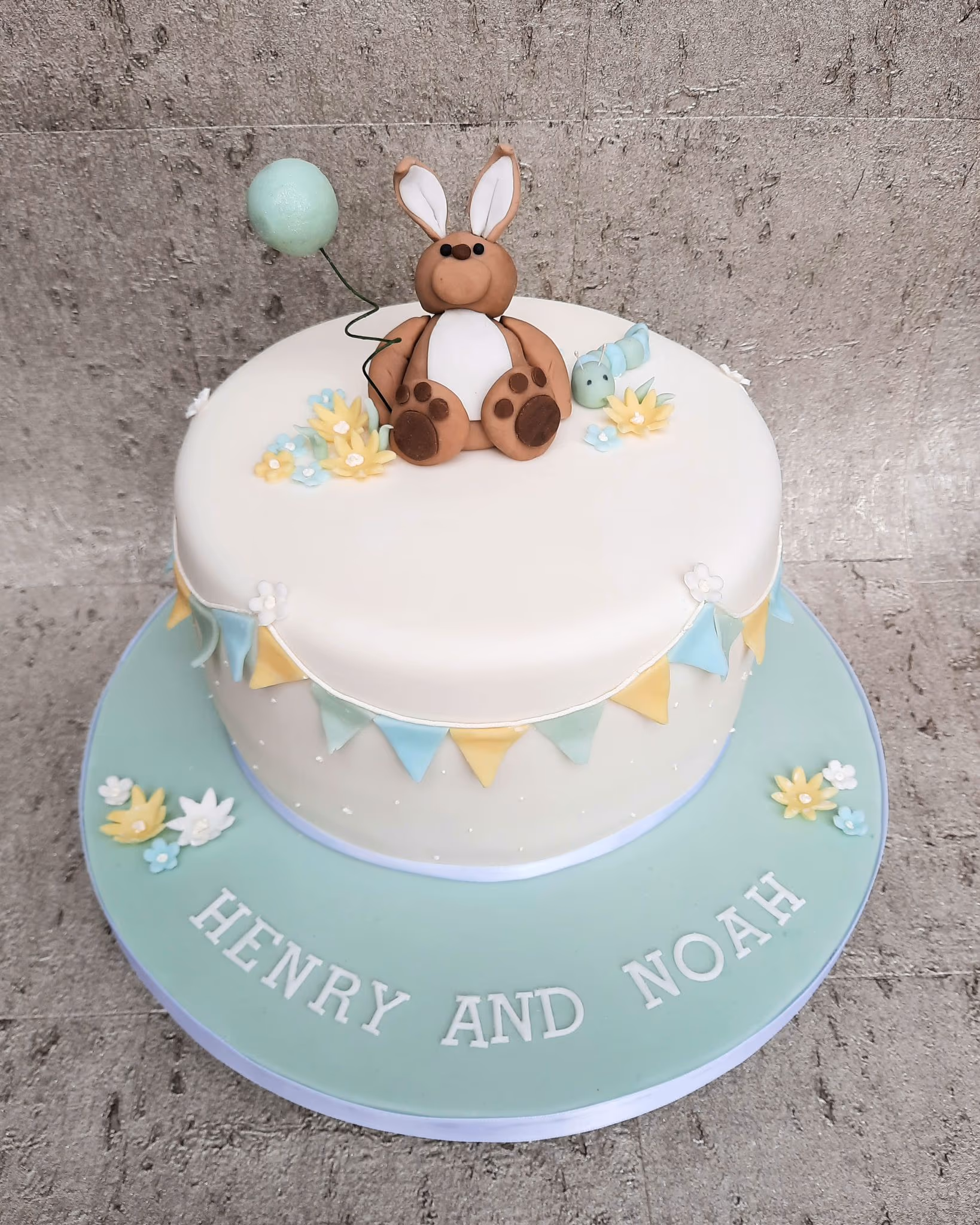 Two tier baby christening cake henry and noah kangaroo balloon bunting