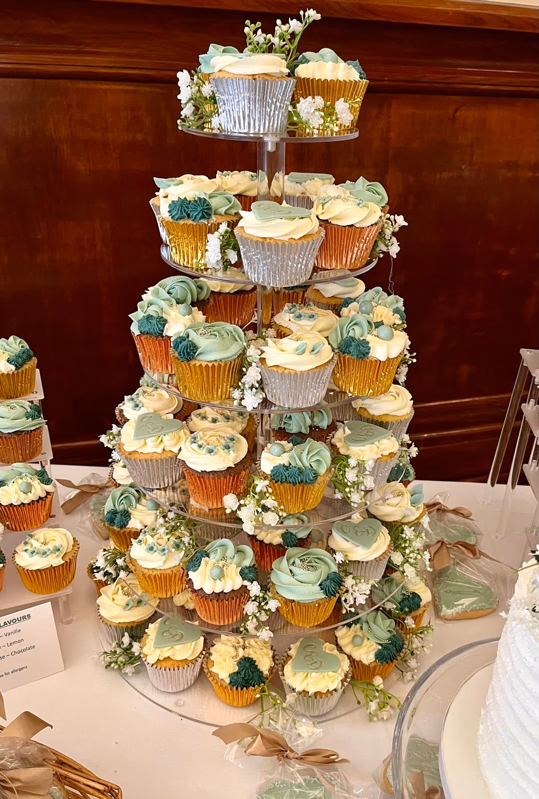Wedding tiered cupcake stand mint green cream gold silver wrappers white flowers