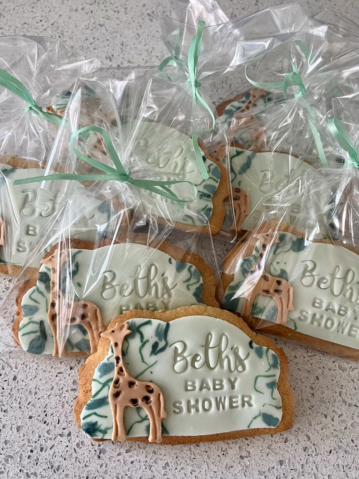 Individually wrapped giraffe baby shower biscuits