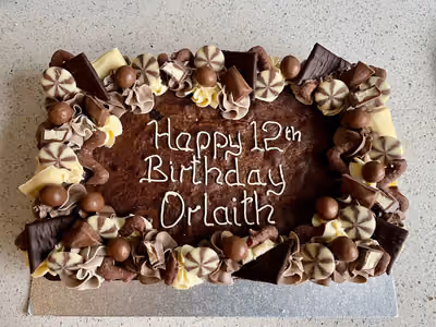 Birthday brownie with mixed sweets and chocolates