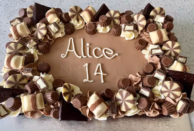 Rectangular birthday brownie slab with Kinder chocolate decoration