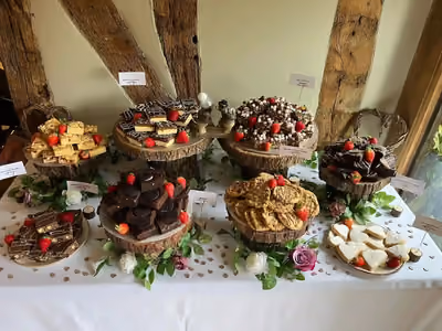 Dessert table with handmade brownies, rocky road, and shortbread